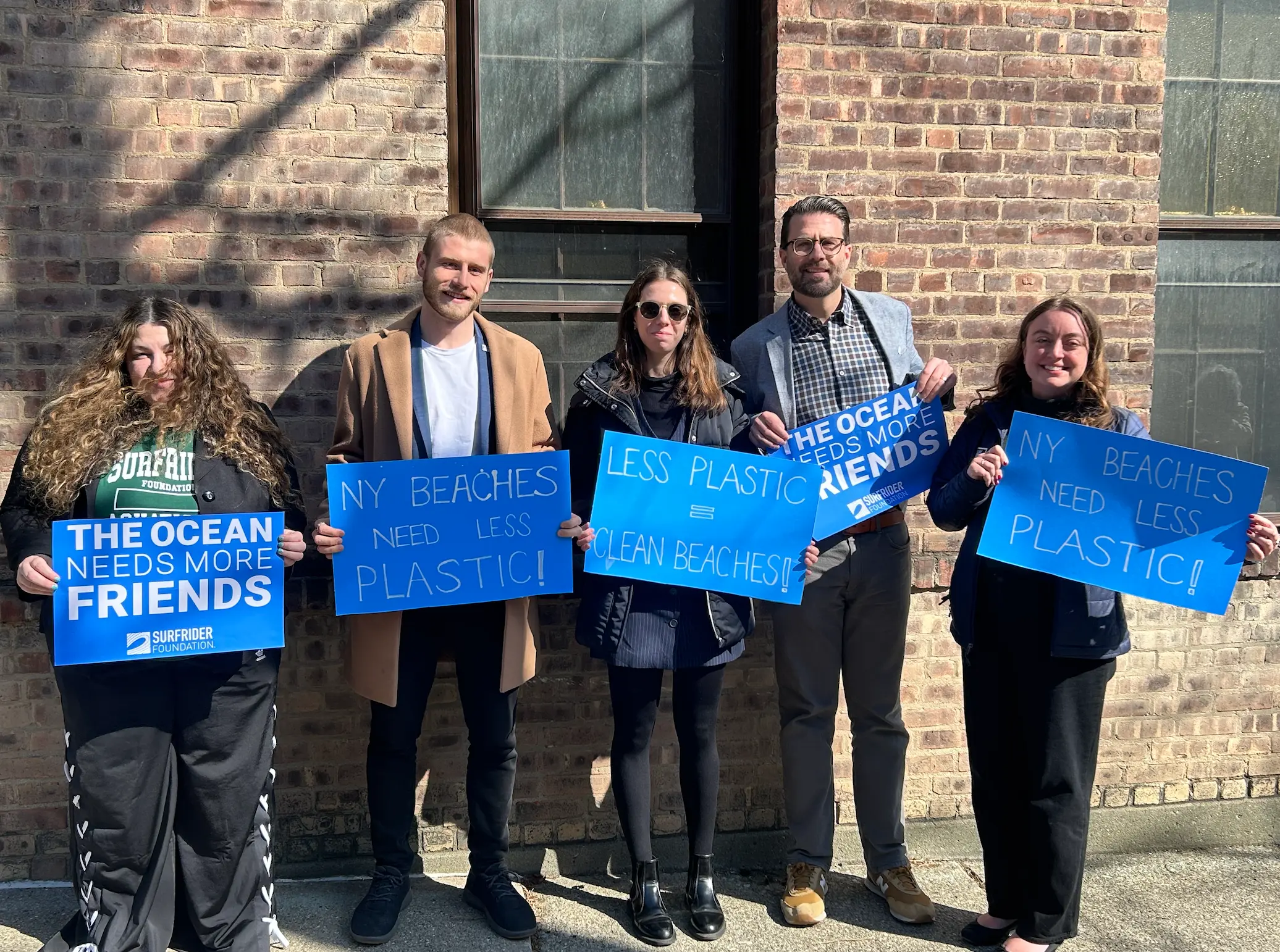 Surfrider NYC protesting for a ban on plastic